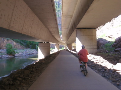 Under the Interstate (I-70).